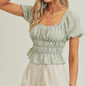 Women’s light green blouse